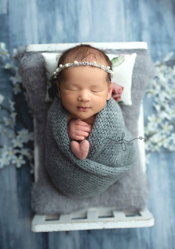 Newborn in a bed ct newborn photography session | CT Newborn photographer Elizabeth Frederick Photography
