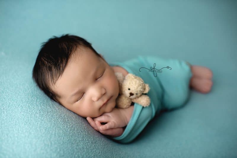 Wrapped newborn pose idea | newborn with stuffie | CT Newborn Photographer