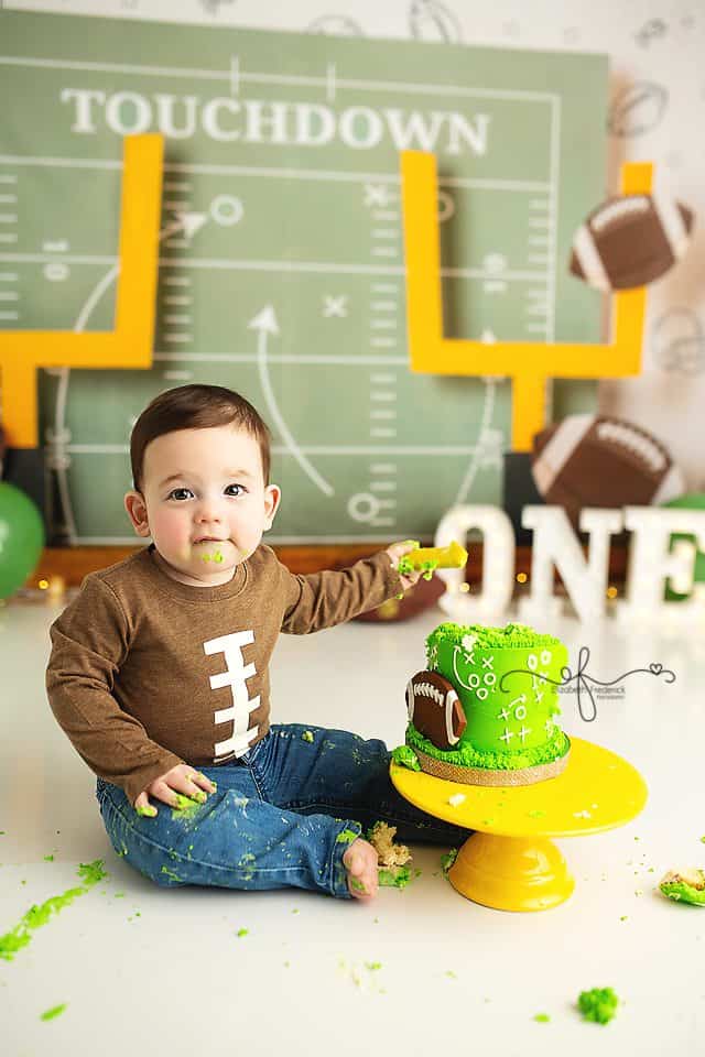 First Down football smash cake session for a first birthday in Connecticut